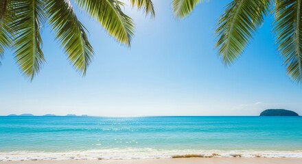 Palm fronds frame a tranquil turquoise ocean meeting a sandy beach under a clear blue sky