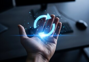 A human hand holds a glowing blue refresh or recycle icon, symbolizing update, cycle, or sustainability in a digital environment.
