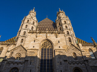 Vienna, Austria &ndash; April 30, 2024: Facade of St. Stephen's Cathedral with Gothic Towers and Patterned Roof