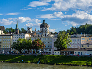 Salzburg, Austria &ndash; May 1, 2024: Kollegienkirche and Salzach River in the Old Town Skyline