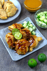 Batagor served with peanut sauce. Sundanese dish from Indonesia, and popular in Southeast Asia, consisting of fried fish dumplings