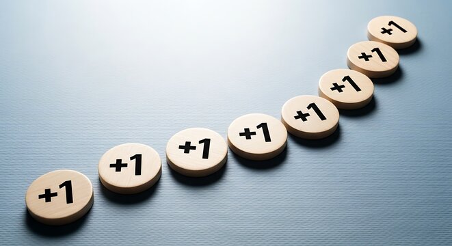 Wooden tokens with 1 inscribed, arranged in an upward diagonal line on a textured blue surface