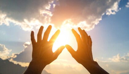 Human hands reaching for the bright sun in the sky, a powerful symbol of hope, faith, and new beginnings