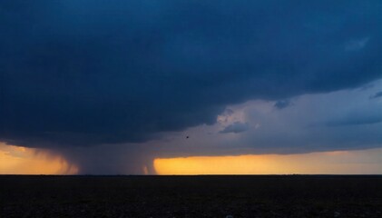 Ominous storm clouds gathering over a desolate, rocky landscape under twilight. A dramatic shot of heavy, dark storm clouds gathering and obscuring the sky above a desolate, rocky, and barren