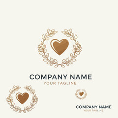 Elegant Heart Emblem with Floral Wreath and Company Branding.