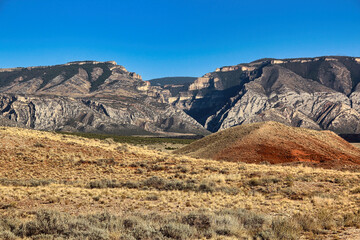 Beautiful Autumn View of the Red Orange Hills with a Close Up View of a Canyon in the Bighorn Mountains while Driving the John Blue Canyon Road in Wyoming.