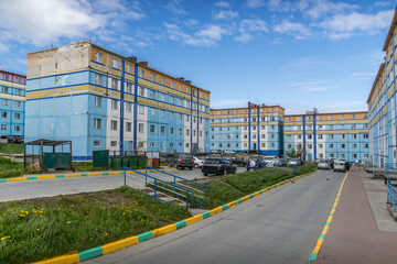 Apartment blocks in Anadyr courtyard, a remote Arctic morning.
