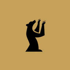Stylized black bear silhouette standing upright with arms raised on golden backdrop