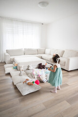 Screen Free Play, Little Girl Engaged with Toys in Minimalist Montessori Home