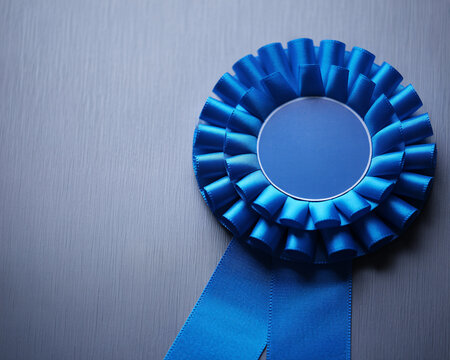 Elegant blue award ribbon, perfect for celebrating achievements and recognizing excellence, ideal for corporate events and special occasions