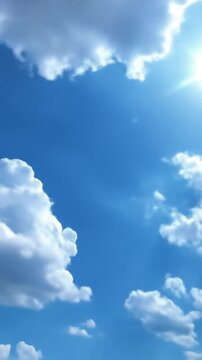 Bright blue sky with fluffy white clouds and a radiant sunbeam breaking through across the horizon!!