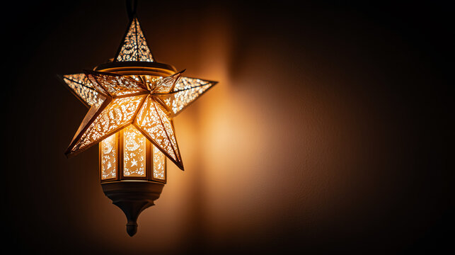 Beautiful handcrafted star lantern shining brightly indoors during Filipino Simbang Gabi Christmas celebration