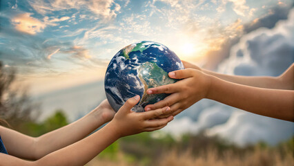 Children holding a globe together outdoors, symbolizing unity, environmental protection, and global responsibility