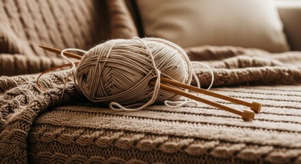 Cozy Knitting Scene With Yarn and Needles on Textured Blanket Soft Lighting