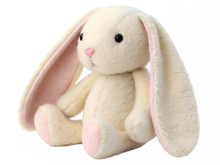 Cute fluffy white stuffed bunny rabbit with long floppy ears sitting down isolated on transparent background