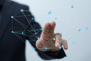 Businessman interacting with a futuristic network concept. Representing connection, data, innovation, and communication.  Ideal for technology,