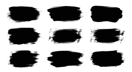 Collection of Nine Grungy Black Paint Brush Strokes Isolated on a White Background Texture