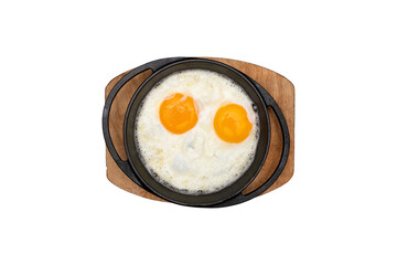 Top-down transparent PNG of double yolk fried eggs in a pan, ideal for breakfast and menu design.