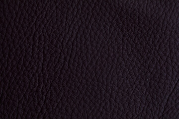 High-quality texture of dark burgundy leather. Perfect for backgrounds, textures, and design elements. Adds a touch of elegance and sophisticati