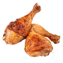 Two delicious golden brown roasted chicken drumsticks, isolated on transparent background