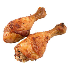 Two appetizing golden brown roasted chicken drumsticks, isolated on transparent background