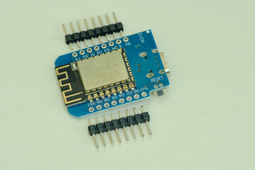 ESP8266 NodeMCU microcontroller isolated on a white background
