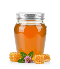 Oval Shaped Glass Jar of Orange Blossom Honey with metal cap without label area and surrounded by...