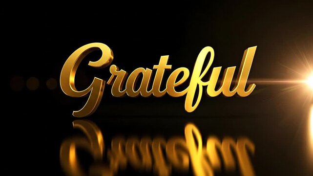 Elegant golden word grateful on dark background with lens flare