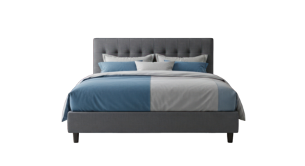Cozy, gray bed with blue and white bedding against a dark backdrop