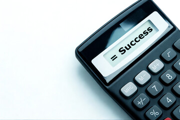 Obraz premium Calculator displays success formula on white background