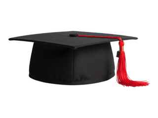 Graduation cap with red tassel against black backdrop