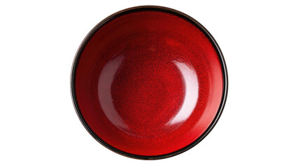 Overhead shot of an empty red bowl, with a dark rim, set against a black background