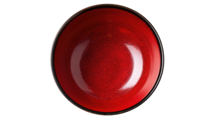 Overhead shot of an empty red bowl, with a dark rim, set against a black background