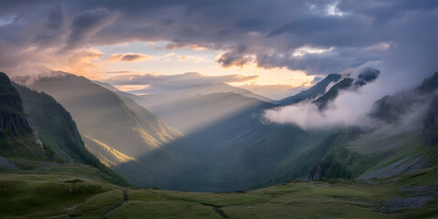 Misty mountain valley sunrise serenity dramatic clouds and soft light over rolling hills