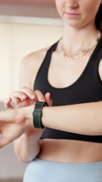 Studio, yoga and woman with smart watch for health app, tracking cardio and exercise progress. Gym, happy and person with digital tech for time, wellness results and workout stats for pilates class