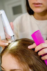 Fototapeta premium Trichological and dermatological examination of the scalp