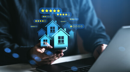 Real estate market online review and rating concept with house icons and star feedback displayed on...