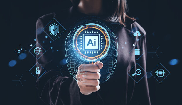 Human hand holding digital magnifying glass with AI chip hologram and brain interface concept on dark background with futuristic technology icons.