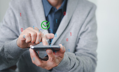 A businessman is using a fingerprint scan for biometric authentication on a smartphone. Verification, cybersecurity, and protecting personal digital data from online threats and cyber attacks.