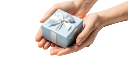 Close-up of hands gently presenting a light blue gift box with a silver ribbon, symbolizing celebration, thoughtfulness, and the joy of giving, perfect for holidays and special occasions