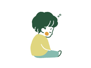 座りながらうたた寝している男の子