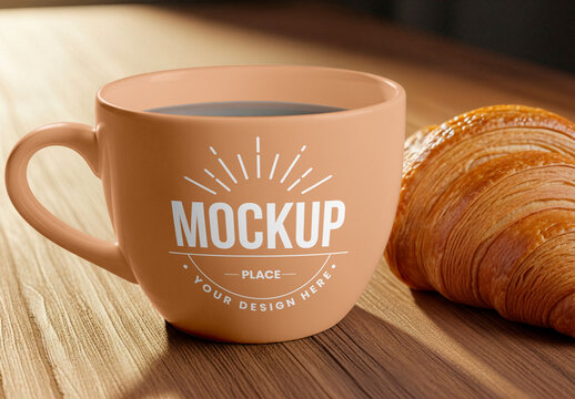 Mockup of Coffee Cup and Croissant