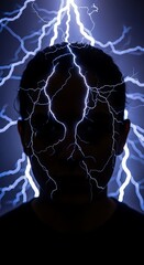 Silhouette of a person with electric energy illuminating the head.