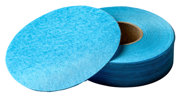 Blue Pad Discs: A stack of neat, blue pad discs. The discs are stacked and perfect for industrial work.