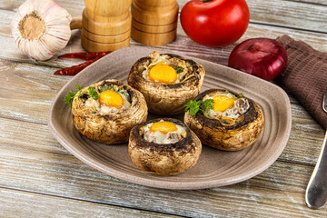 Baked champignon with quail egg