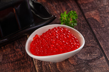 Salmon red caviar in the bowl