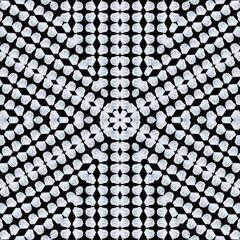Beautiful Geometric Arrangement of Delicate White Elements on Dark Surface Offering a Unique Visual Experience
