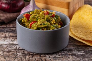 Green spicy Mexican guacamole dip