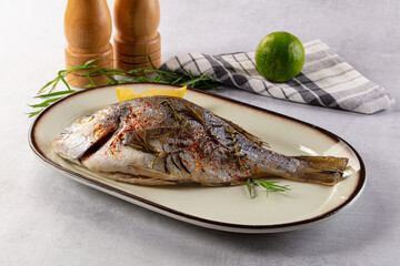 Baked dorada fish with spices