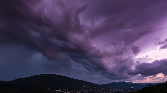 midgard. Dark purple storm clouds gathering before rainfall, dramatic sky formation, natural weather phenomenon. travel magazines, destination branding, designed for travel destination branding.
